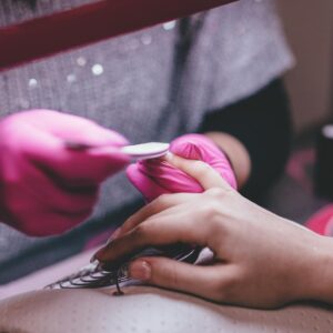 Close-up of Woman Having Manicure